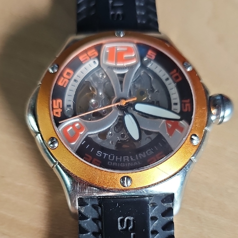Stuhrling Original Silver and Orange Skeleton Watch
